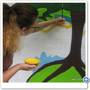 Lauren DeMarsh working on the Tree of Peace. The Iriquois used the white pine tree as their symbol for peace and likened its roots stretching to all corners of the earth to the extension of peace and law to all humankind. The branches symbolized shelter, security, and protection provided by the law of peace.